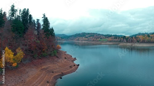 Cinematic view of lake Lokve, region Gorski Kotar, Croatia at autumn time photo