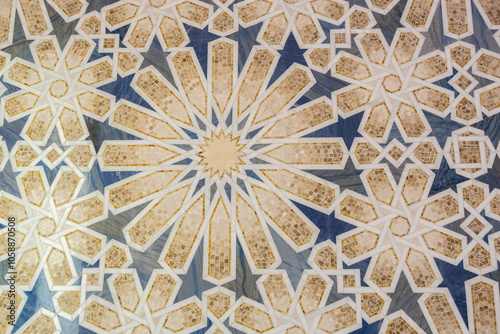 Arabic style, granite and marble floor mosaic with star and floral geometric motifs and patterns in Abu Dhabi, UAE  photo