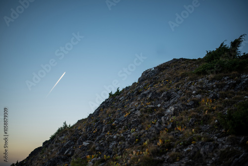 The sunset atop Mount Kopieniec in Zakopane, Poland, casts a warm glow over the Tatra Mountains photo