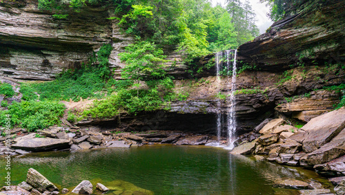 Photos A popular swimming hole surrounded by rock cliffs and lush green foliage is below Greeter Falls in South Cumberland State Park, Tennessee