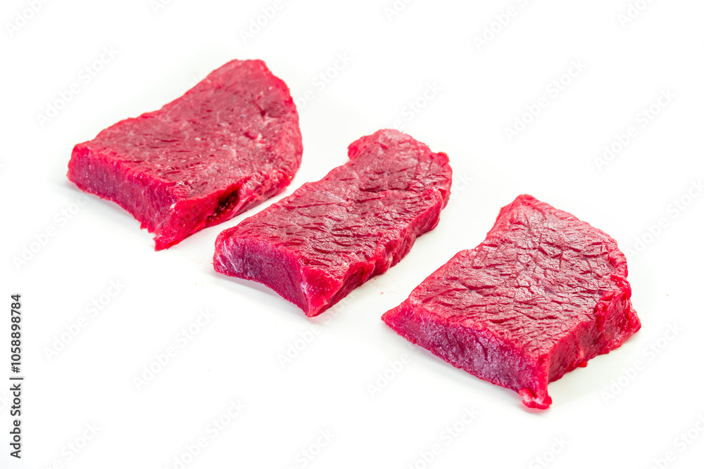 Fototapeta premium Raw beef meat isolated on white background. Food concept