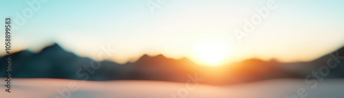 A serene landscape captures a blurred sunrise over distant mountains, evoking tranquility and peace, Ideal for backgrounds in wellness projects, nature-themed designs, or motivational content,