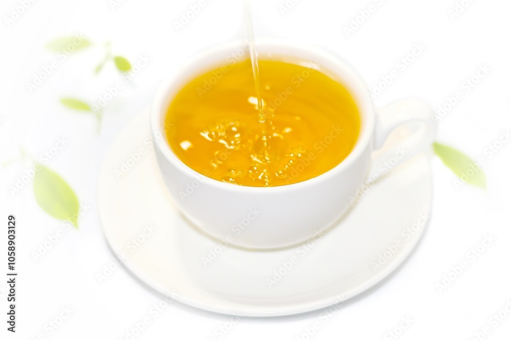 Pouring tea water in cup and serving on white background,isolate pictures. Pouring tea water in cup and serving on white background,isolate pictures.