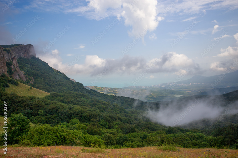 Mountains in Crimea before the rain. Cloud and fog descend on the mountains. Vivid photo of natural landscapes. Mountains in Crimea before the rain. Cloud and fog descend on the mountains. Vivid photo of natural landscapes.