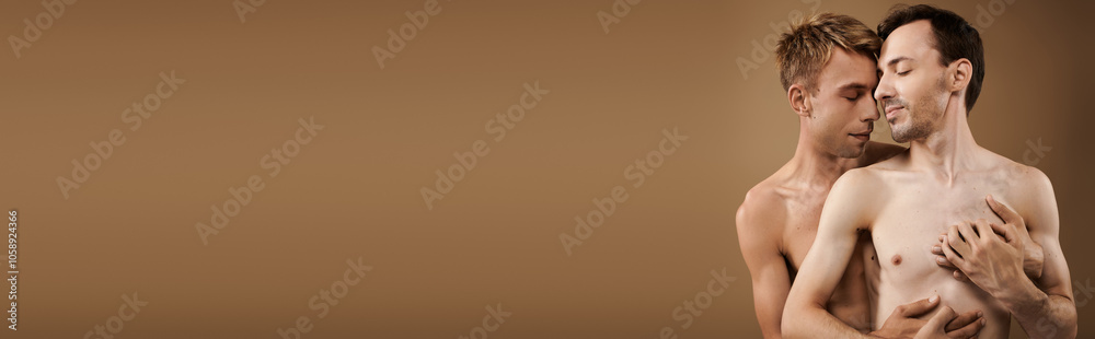 Two young men share a loving embrace, showcasing their affection in a cozy setting. Two young men share a loving embrace, showcasing their affection in a cozy setting.