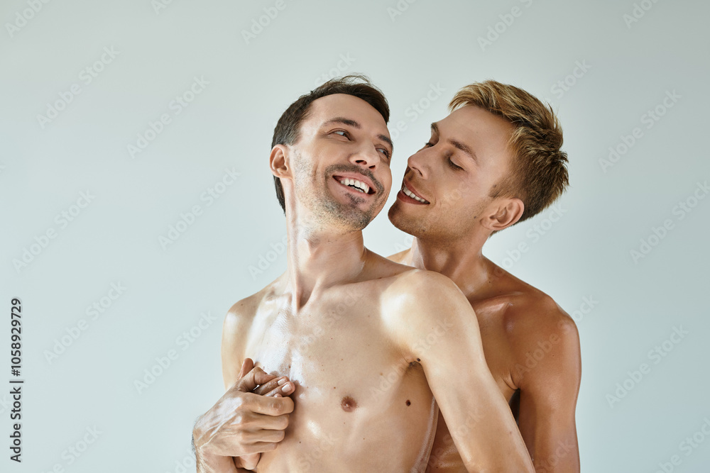 Two young men share a loving embrace, radiating joy and closeness in a bright indoor setting. Two young men share a loving embrace, radiating joy and closeness in a bright indoor setting.