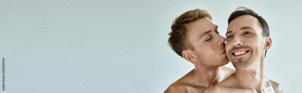 Two young men joyfully embrace, showcasing love and connection in a warm atmosphere. Two young men joyfully embrace, showcasing love and connection in a warm atmosphere.