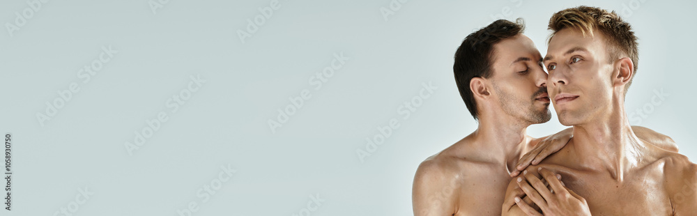 Two young men embrace intimately, sharing a loving gaze in a soft, peaceful atmosphere. Two young men embrace intimately, sharing a loving gaze in a soft, peaceful atmosphere.