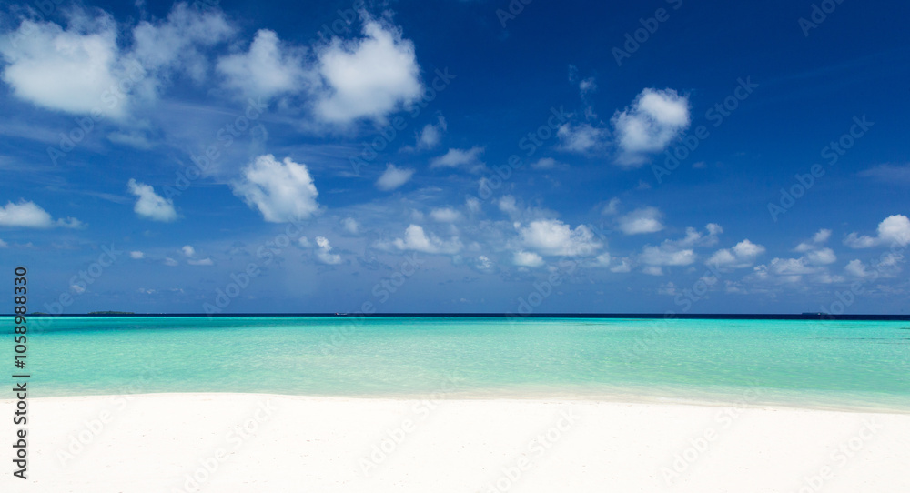 Beautiful beach with white sand. Tropical sea with cloudy blue sky . Amazing beach landscape Beautiful beach with white sand. Tropical sea with cloudy blue sky . Amazing beach landscape