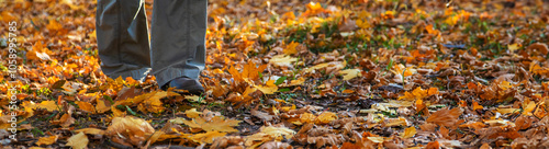 Senior woman in autumn park. Selective focus.