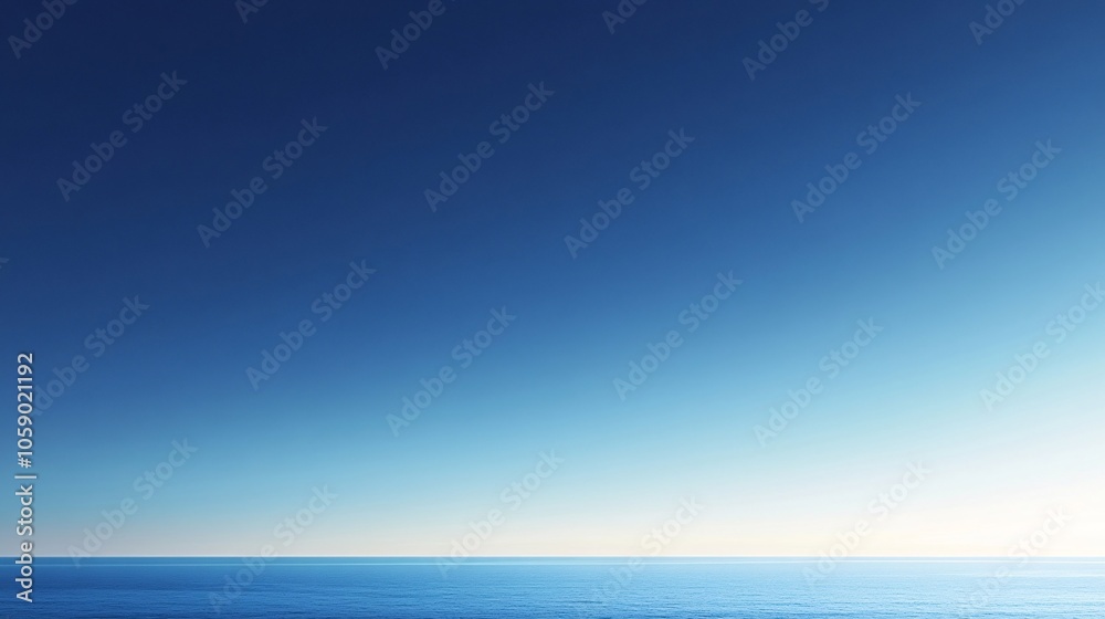 Fototapeta premium A vast expanse of blue ocean meets a clear, blue sky, with a subtle gradient from deep blue to light blue, creating a serene and calming image. Generative ai