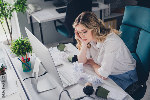 Photo of attractive young woman tired exhausted sleep wear formalwear comfortable modern office room interior indoors workspace