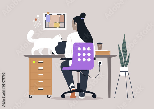 In a tranquil afternoon setting, a person attentively works on a laptop while a curious cat playfully investigates the desk, surrounded by lively decor and a peaceful atmosphere