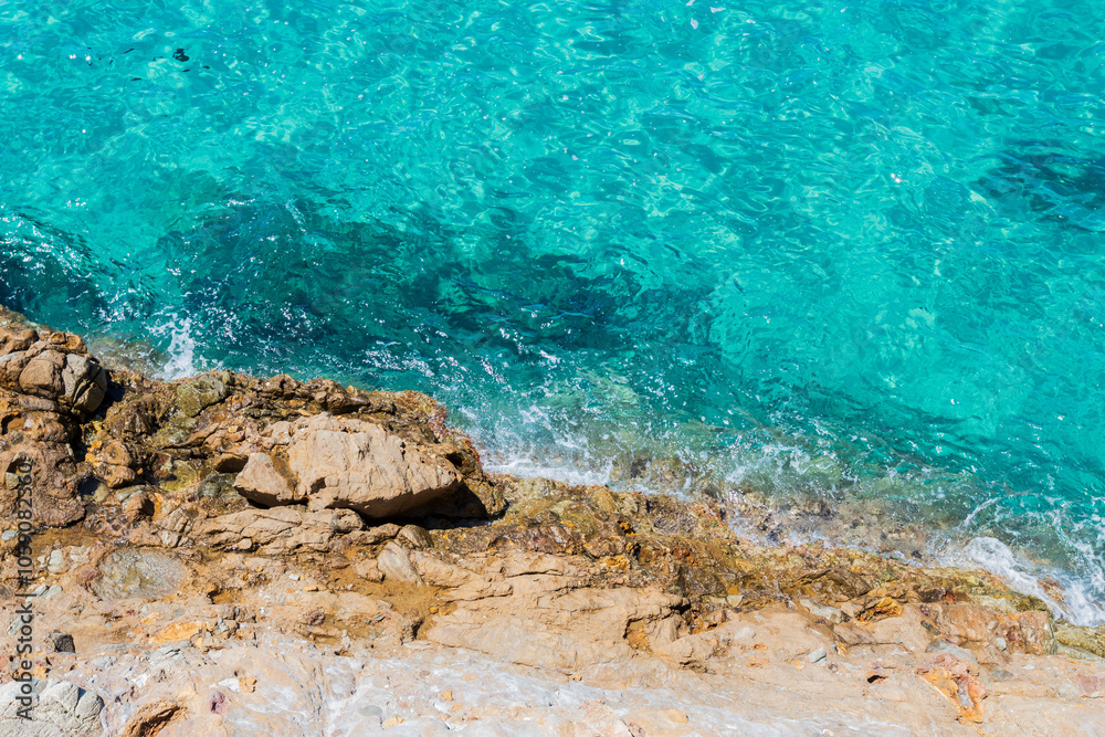 Crystal Clear Waters Along the Rocky Coastline of Greece Crystal Clear Waters Along the Rocky Coastline of Greece