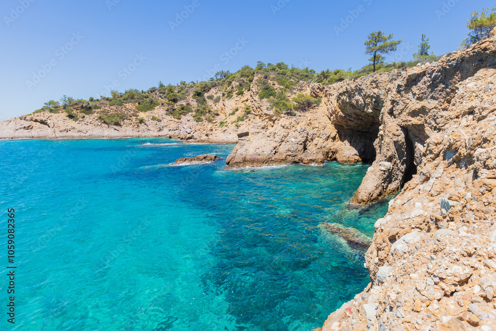 Crystal Clear Waters Along the Rocky Coastline of Greece Crystal Clear Waters Along the Rocky Coastline of Greece