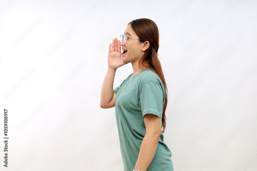 Portrait of young asian woman standing calling for someone, shouting loud and searching around. Isolated on white background Portrait of young asian woman standing calling for someone, shouting loud and searching around. Isolated on white background