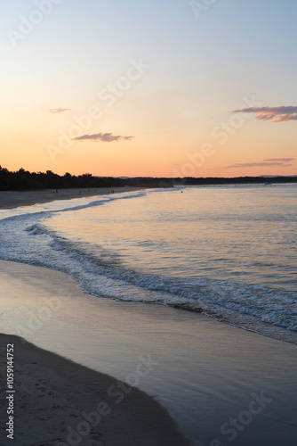 Wallpaper Mural Small waves on beach at sunset Torontodigital.ca