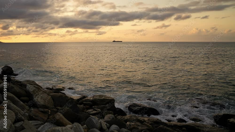 Time lapse of waves breaking on the rocks on a tropical beach at sunset. Macuto Coast, Venezuela. Time lapse of waves breaking on the rocks on a tropical beach at sunset. Macuto Coast, Venezuela.
