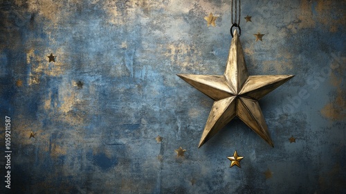 Golden star ornament on a textured blue background with decorative stars feat...