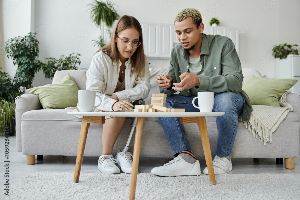 Friends collaborate on a fun game while relaxing on the couch. Friends collaborate on a fun game while relaxing on the couch.