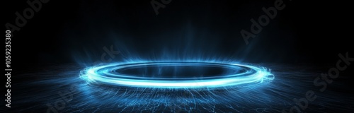 Bright blue glittering energy circle against a black background with glowing ...