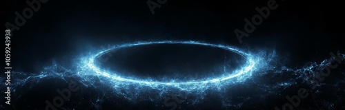 Bright blue glittering energy circle against a black background with glowing ...