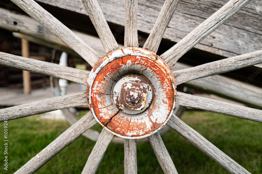 Original wooden western expansion conestoga wagon wheel from an old Conestoga wagon in need of restoration Original wooden western expansion conestoga wagon wheel from an old Conestoga wagon in need of restoration