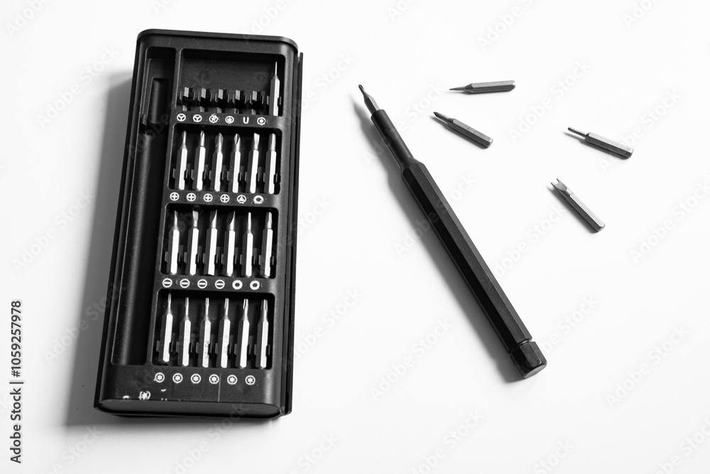 Screwdriver with a set of attachments for phones Screwdriver with a set of attachments for phones