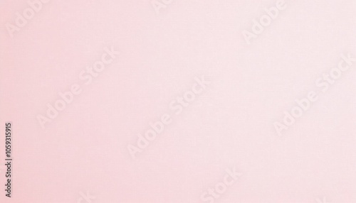 Light pink textured paper background in soft pastel tone photo