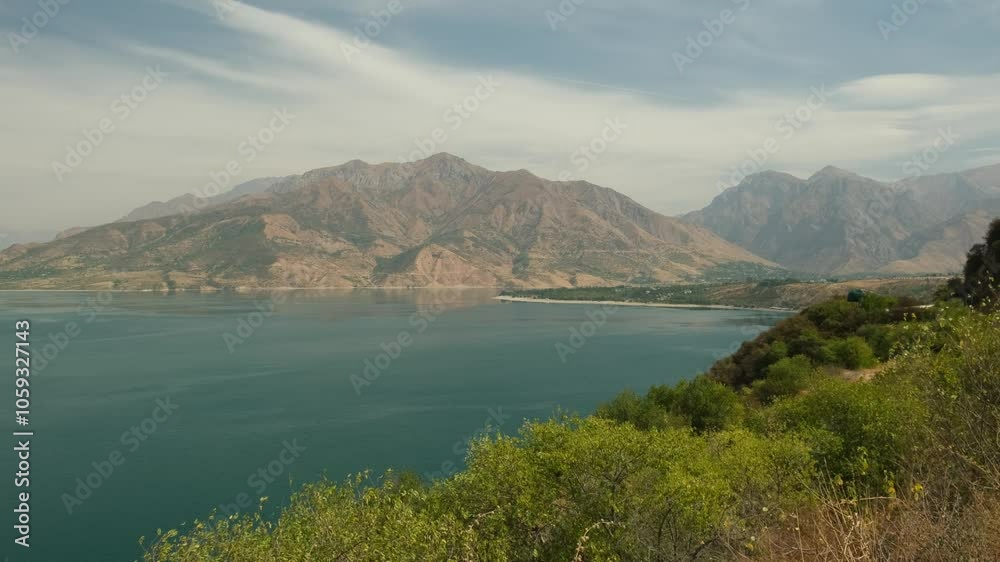 Charvak reservoir and mountains on the horizon Charvak reservoir and mountains on the horizon