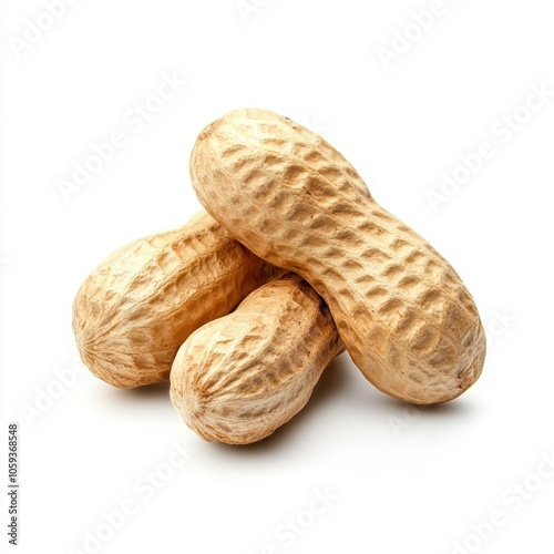 Three raw peanuts with a textured shell, stacked together, showcasing their natural color and shape against a white background.