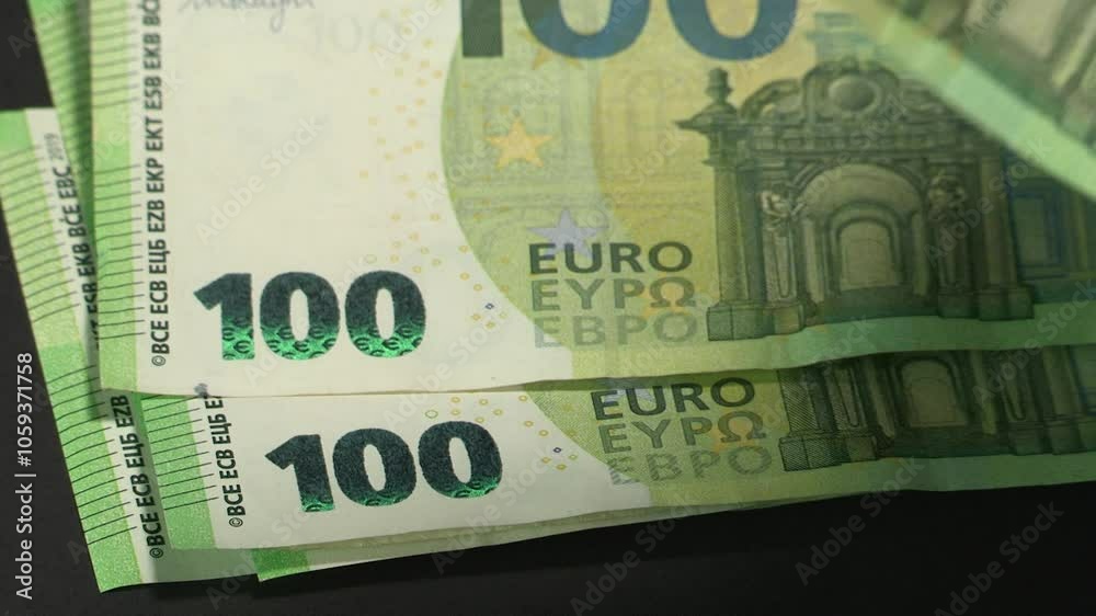 Leaf through 100 EURO banknotes on table Leaf through 100 EURO banknotes on table