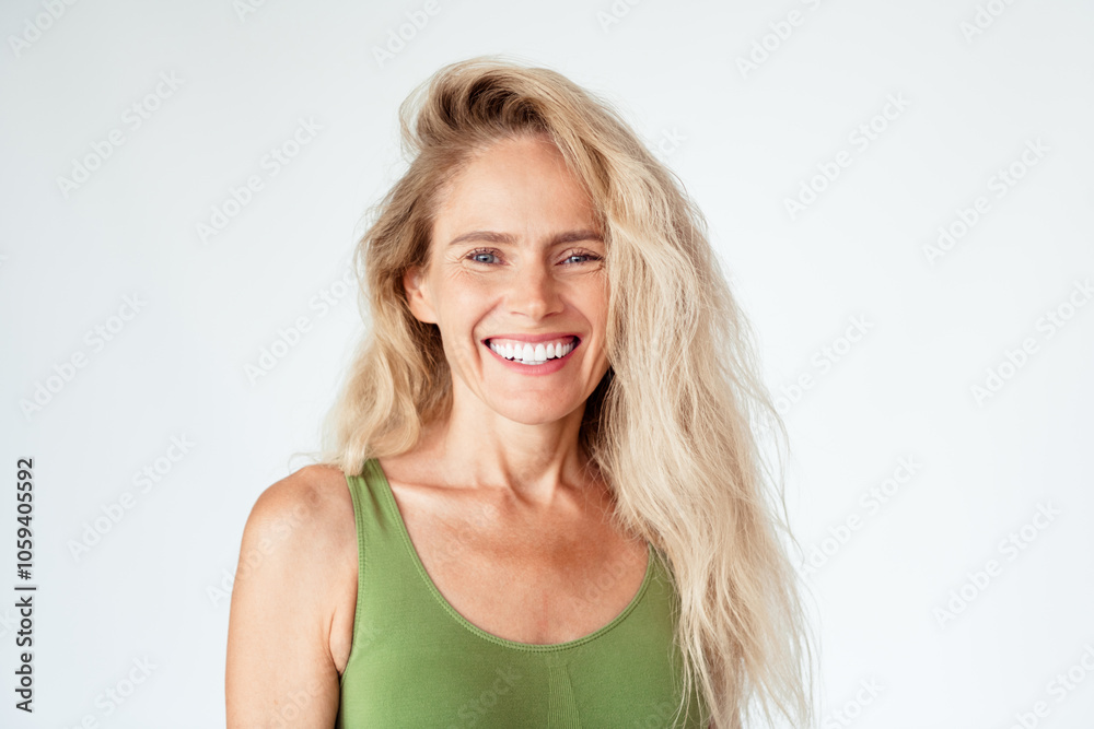 Photo of gorgeous mature blonde lady cheerful toothy smile wear khaki lingerie isolated white background no retouch Photo of gorgeous mature blonde lady cheerful toothy smile wear khaki lingerie isolated white background no retouch