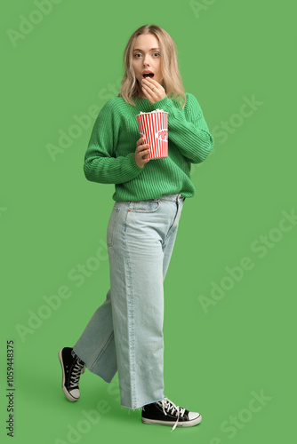 Young woman with bucket of ...