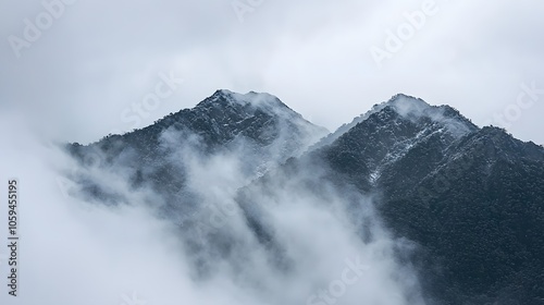 Fading Landscape: Hills recede into the mist, leaving behind a sense of quiet isolation. 