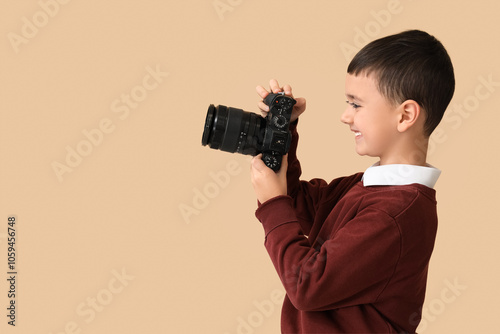 Cute little photographer wi...