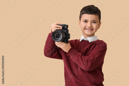 Cute little photographer wi...