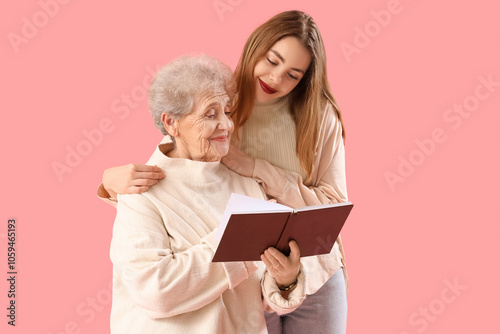 Young woman hugging her gra...