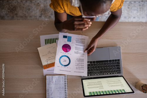 Woman analyzing financial report