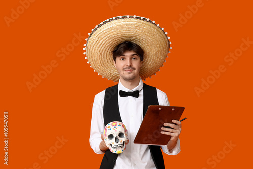 Young male waiter with somb...