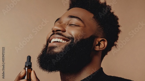 Happy Man with Beard Applying Beard Oil