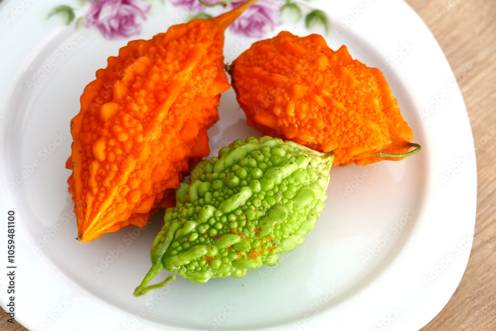ripe and yellow Momordica charantia (Mother melon) fruit for stomach upset,