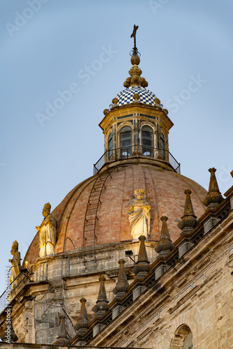 Walking in old part of Jerez de la Frontera, Sherry wine making town, Andalusia, Spain in summer, architectural details, Andalusian style, churches and towers