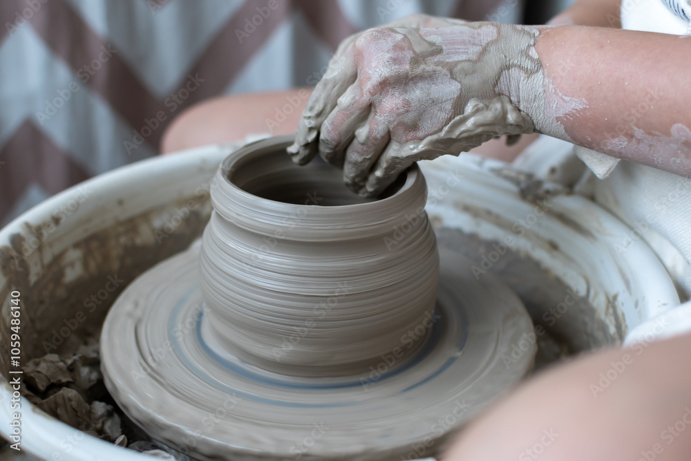 Making of mud pot on potters wheel during workshop in art ceramic atelier in Poland Making of mud pot on potters wheel during workshop in art ceramic atelier in Poland