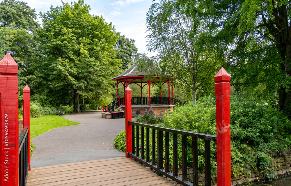 Ornate wooden gazebo or pagoda in a public park Ornate wooden gazebo or pagoda in a public park