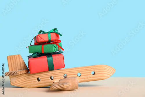 Wooden airplane and gift bo...
