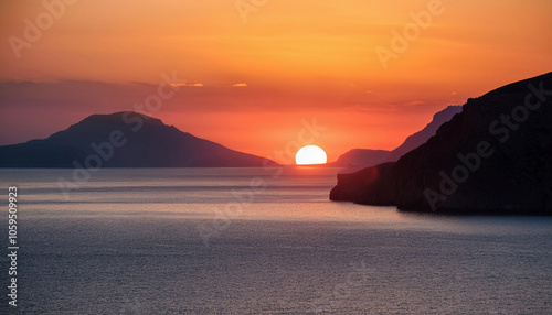 Aerial shot of the Aegean sea and majestic rocky mountains at sunset with orange sun in Türkiye photo