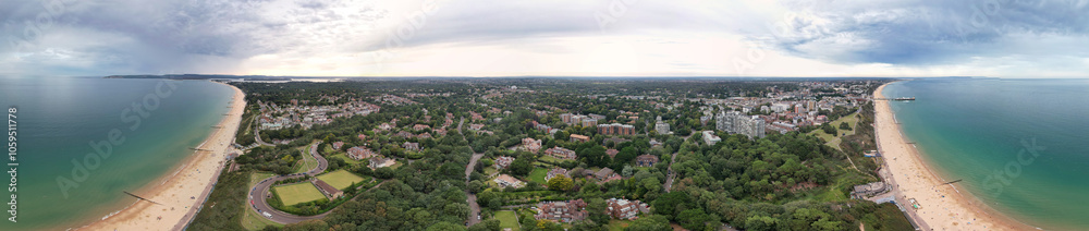 Fototapeta premium Aerial Panoramic View of Best British Tourist Attraction at Bournemouth City of England Great Britain UK. High Angle Footage was Captured with Drone's Camera from High Altitude on August 23rd, 2024