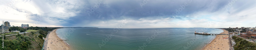 Fototapeta premium Aerial Panoramic View of Best British Tourist Attraction at Bournemouth City of England Great Britain UK. High Angle Footage was Captured with Drone's Camera from High Altitude on August 23rd, 2024