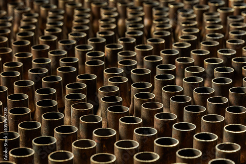 Empty cartridges from machine gun arranged in chaotic manner photo